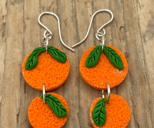 Double orange dangly earrings
