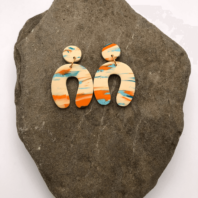 Recharge statement arch earrings 