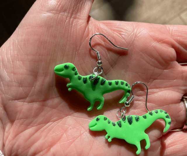 Green and grey T-Rex earrings 